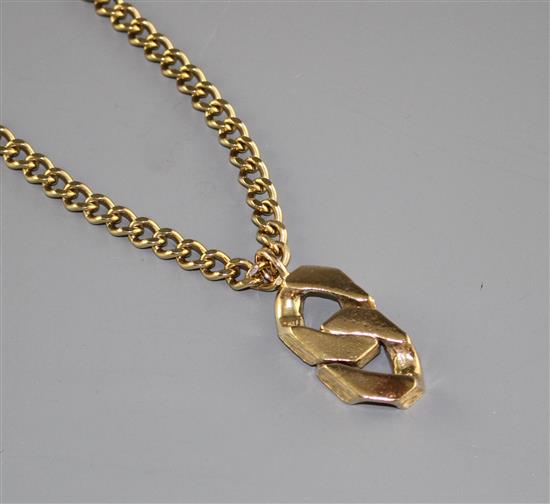 An unmarked heavy gold (tests as 9ct) curblink chain with large double curblink pendant, gross weight 95.9 grams.